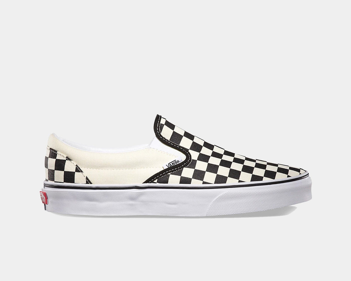 Black-and-white checkerboard slip-on sneaker with canvas upper and rubber outsole.