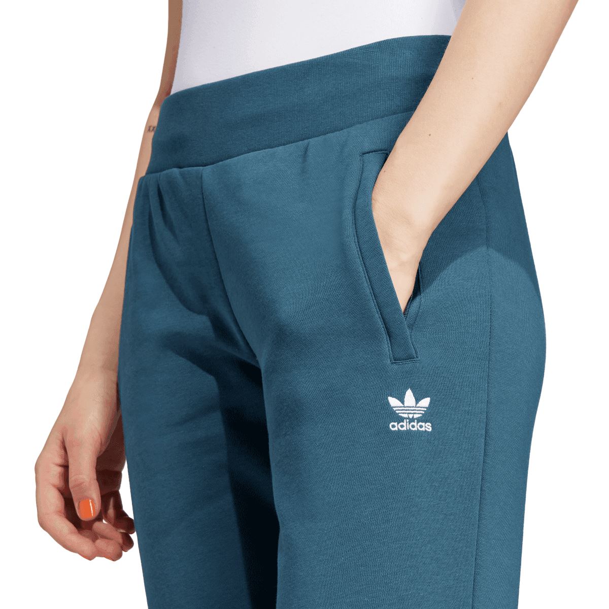 Blue adidas fleece jogger pants with side pockets and stitched logo on thigh
