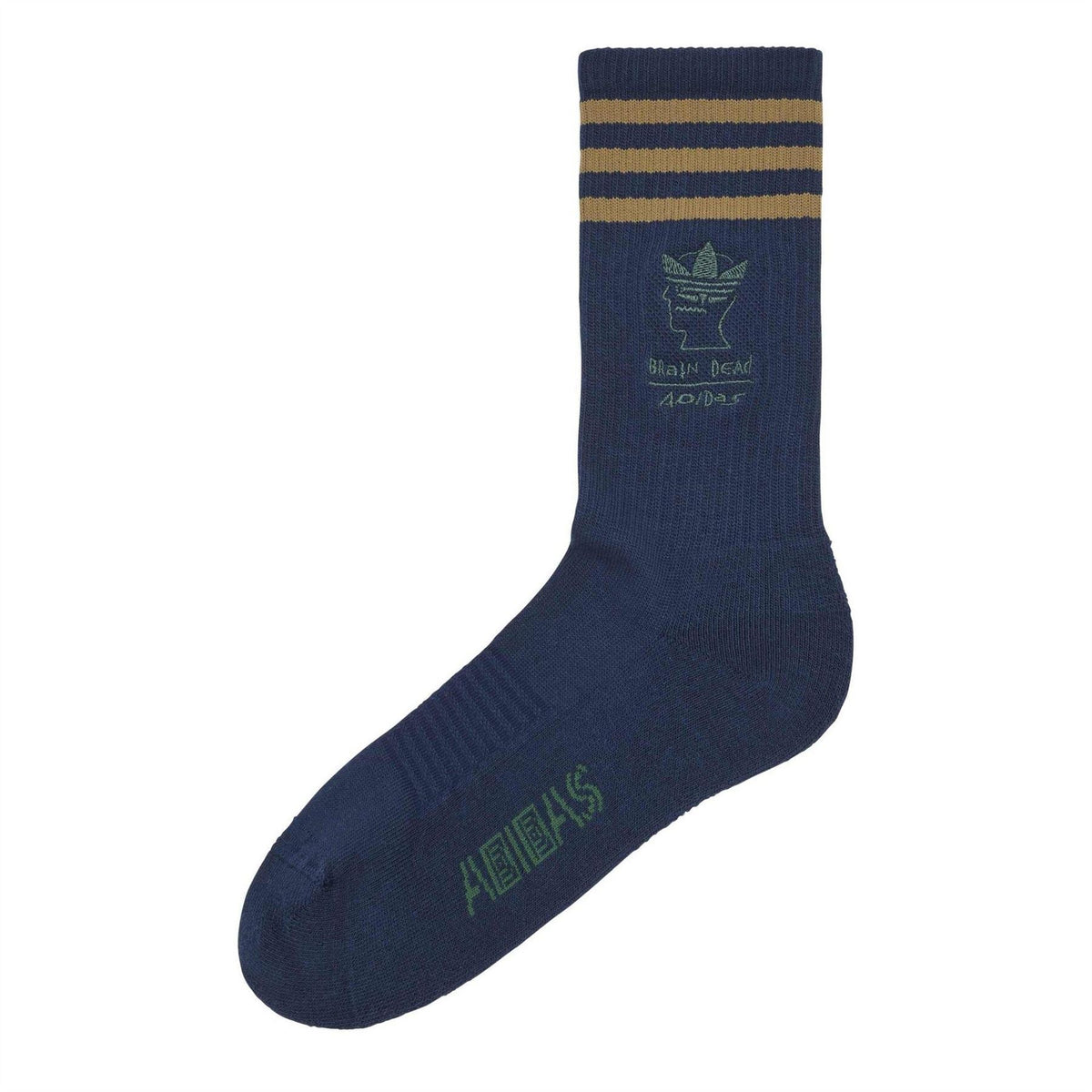 Crew socks in collegiate navy with tan-and-gold striped cuff and green graphic logo