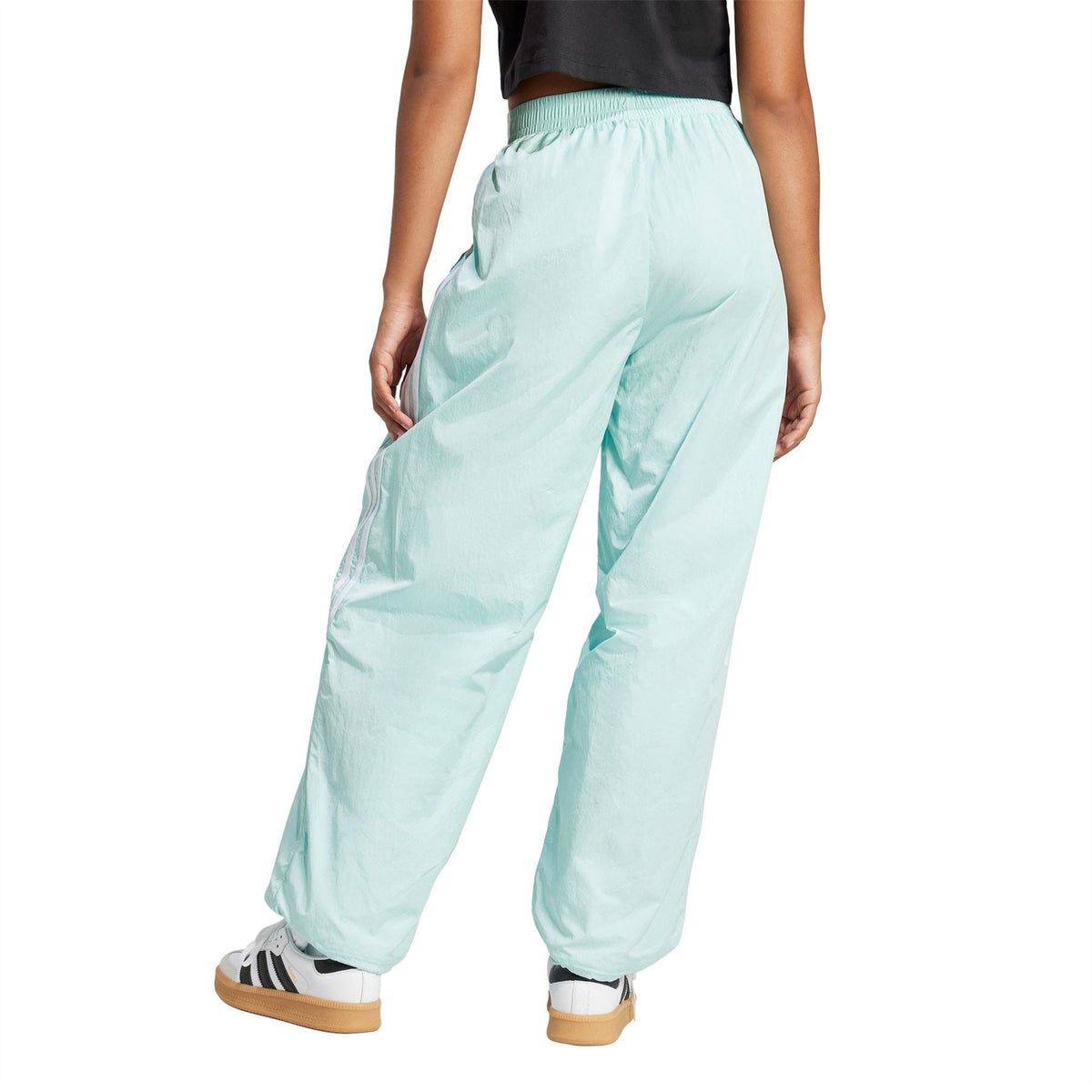 Light aqua track pants with elastic cuffs and side stripe detailing