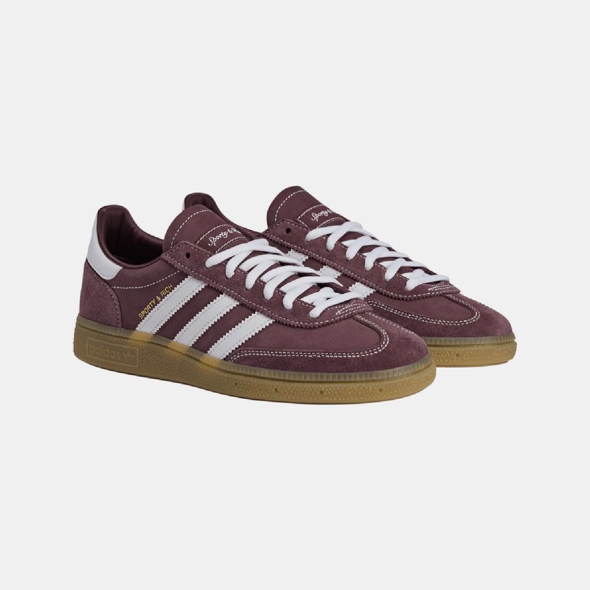 Burgundy adidas Spezial trainers with white stripes and laces, suede panels, gum sole