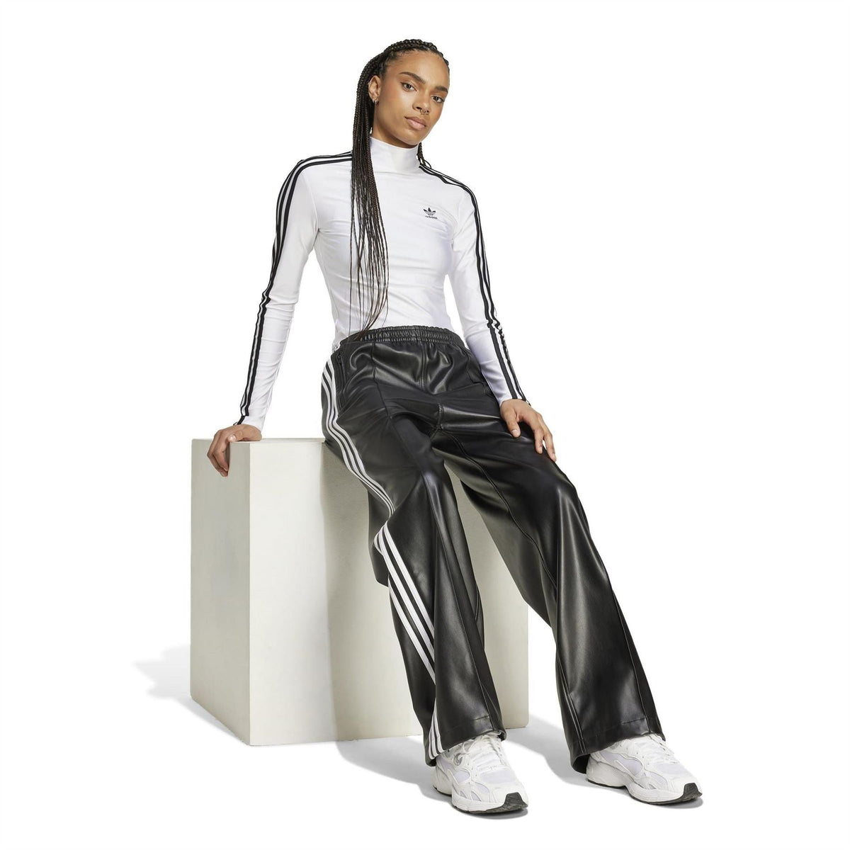 White slim-fit mock neck long-sleeve T-shirt with black side stripe accents