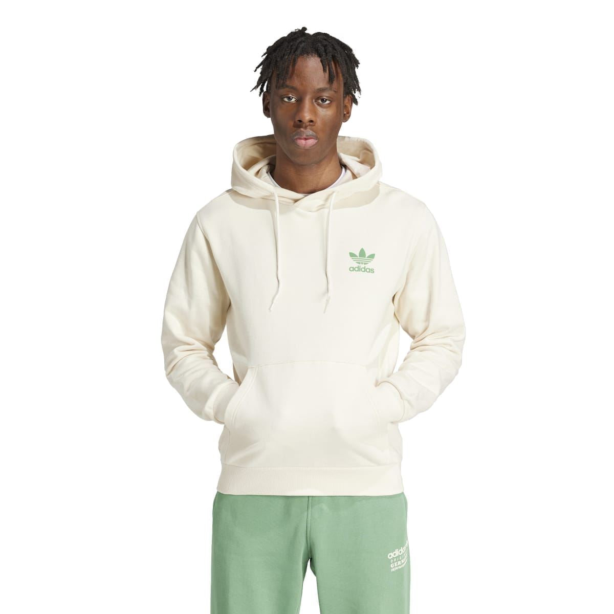 Cream hoodie with adidas trefoil logo on chest and drawstring hood