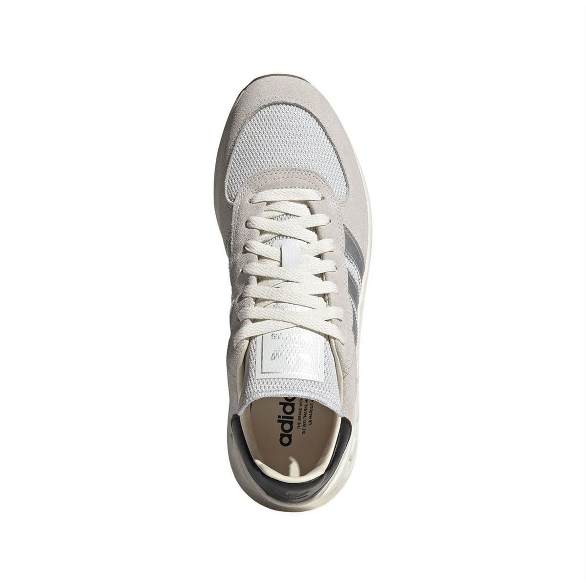 adidas Originals Trainer Lux sneaker view of white lace-up front and grey upper