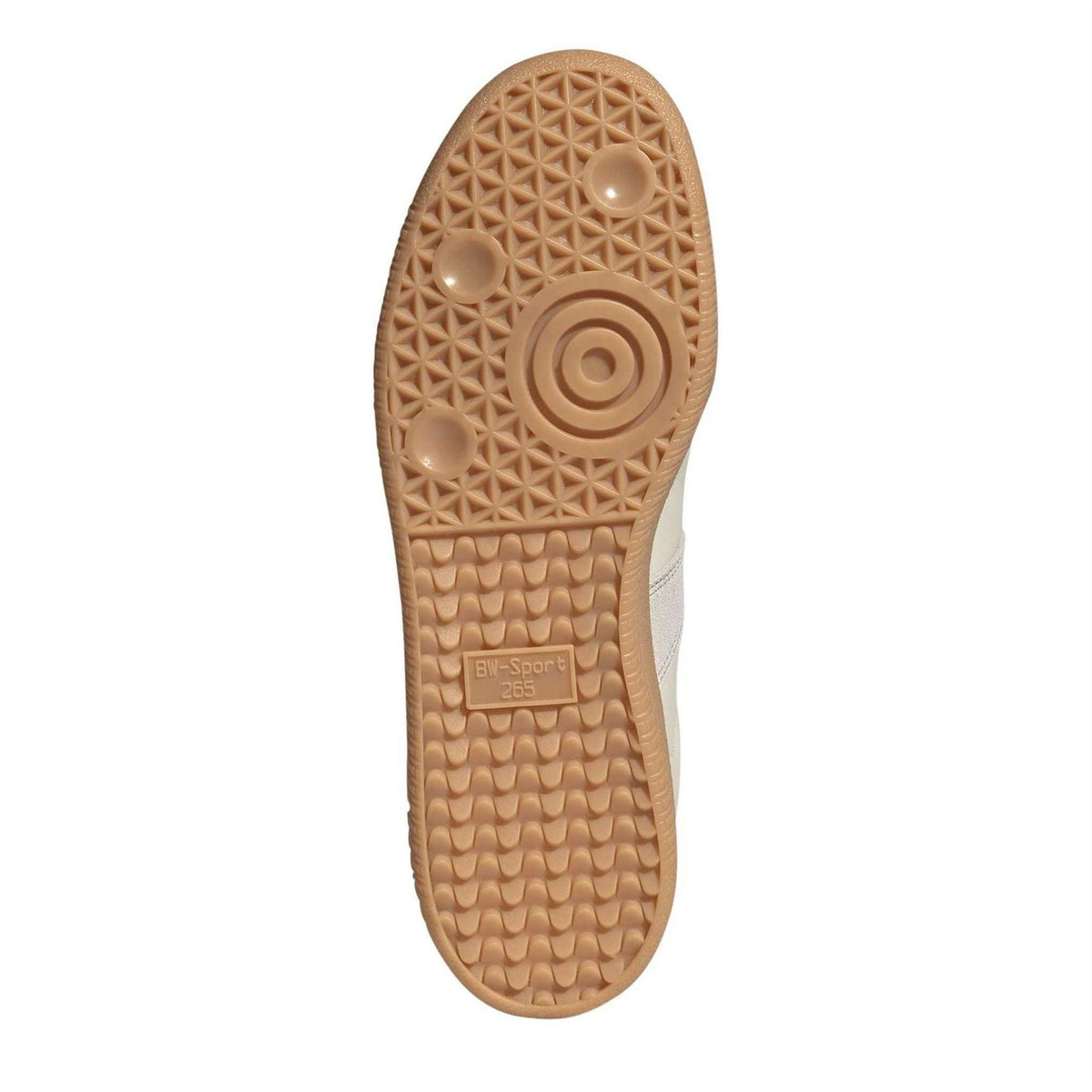 Gum rubber outsole with tread pattern and circular grip detail