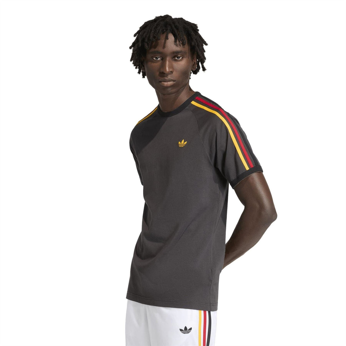 adidas Originals men's black T-shirt with gold trefoil and yellow-red sleeve stripes