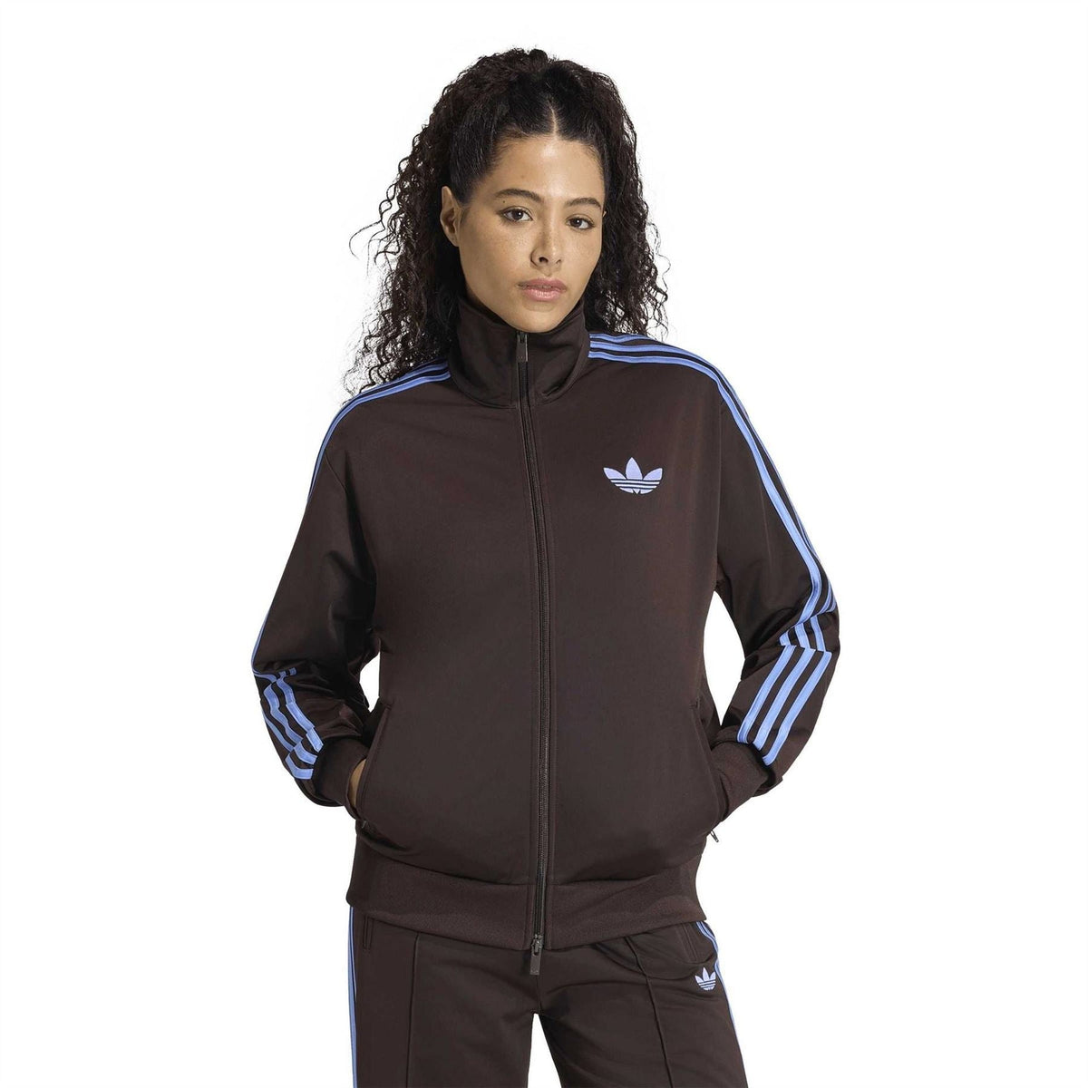 adidas Originals relaxed-fit high-neck zip top with blue triple stripes on sleeves