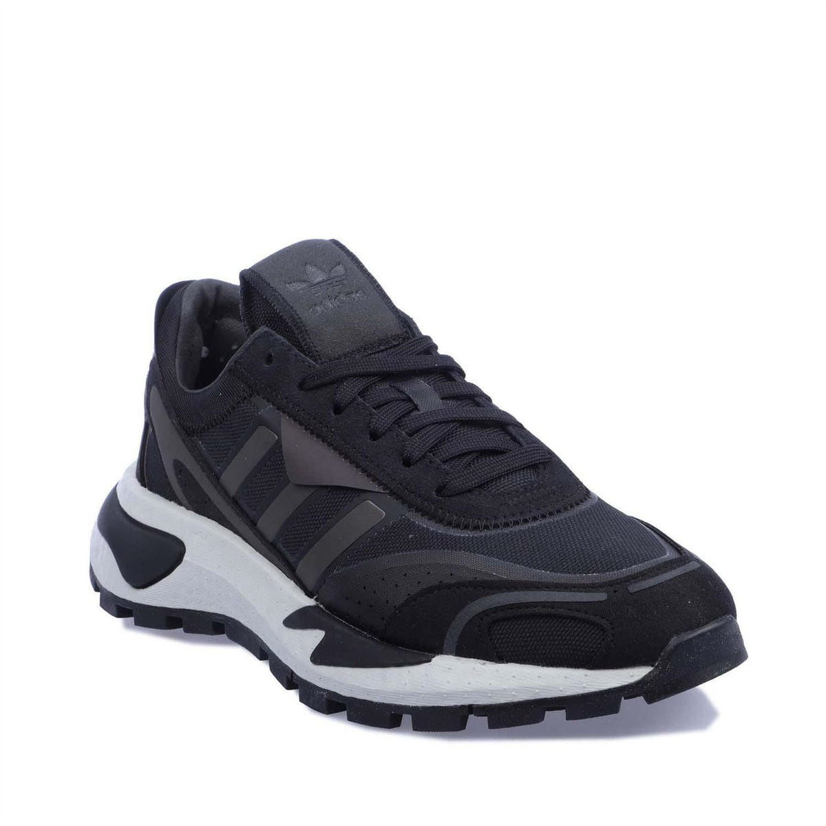 Black low-top trainers with lace-up front, gray stripes, and white midsole
