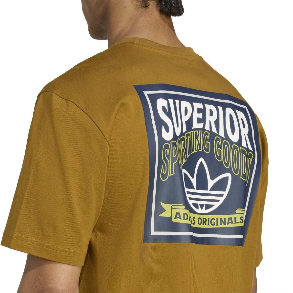 Back view mustard-gold crew neck short sleeve T-shirt with blue “Superior” graphic