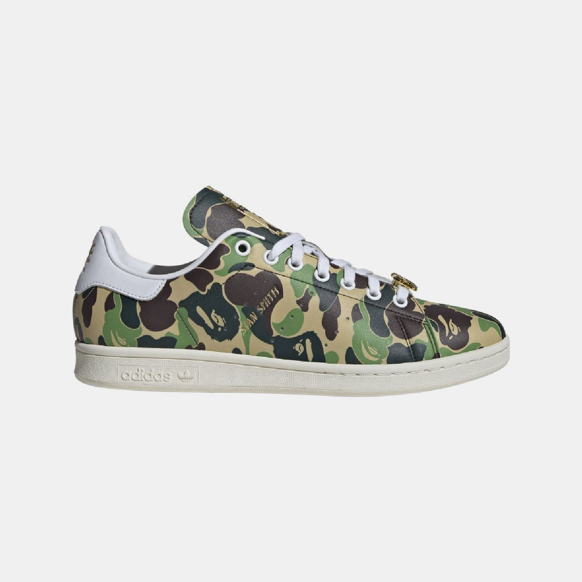 adidas Originals Bape Stan Smith shoes, white footwear with Bape branding, featuring classic tennis shoe design and green heel tab