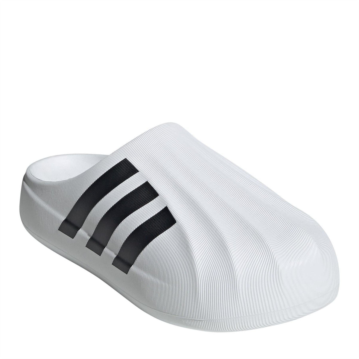 adidas Originals Superstar ML footwear in white with black accents, showcasing classic sneakers with a rubber sole and iconic design