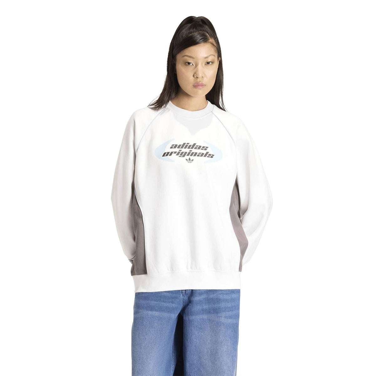 White oversized crewneck sweatshirt with adidas Originals front graphic