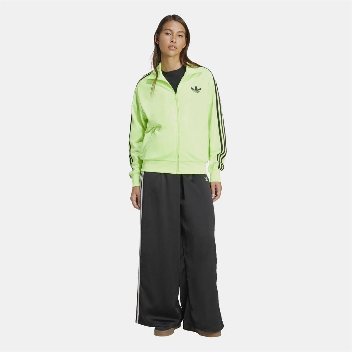 adidas Originals Classic Firebird loose track top sweatshirt in black with iconic 3-stripe design and zip-up front.