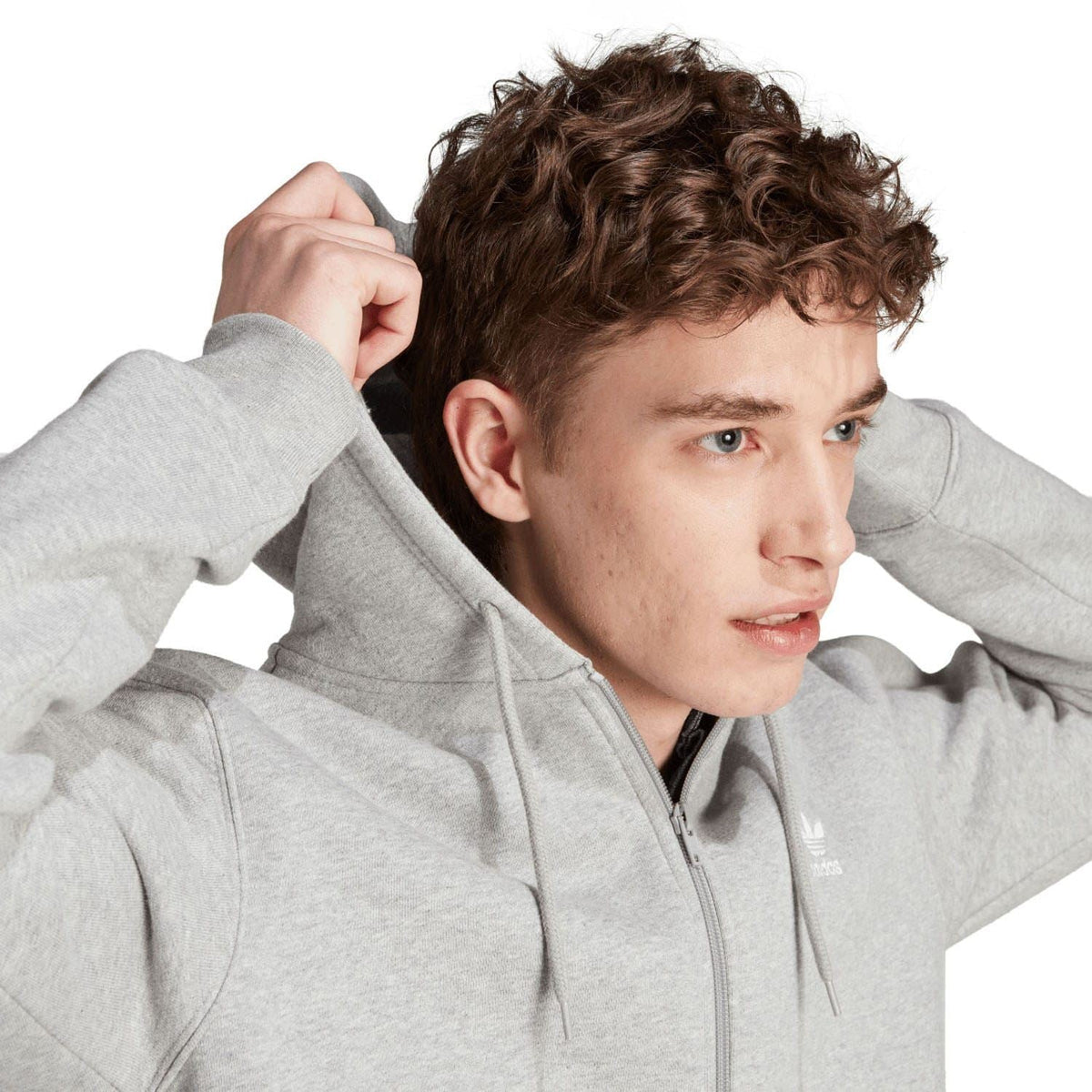 Grey full-zip hoodie close-up of hood and zip front with drawstrings; adidas logo.
