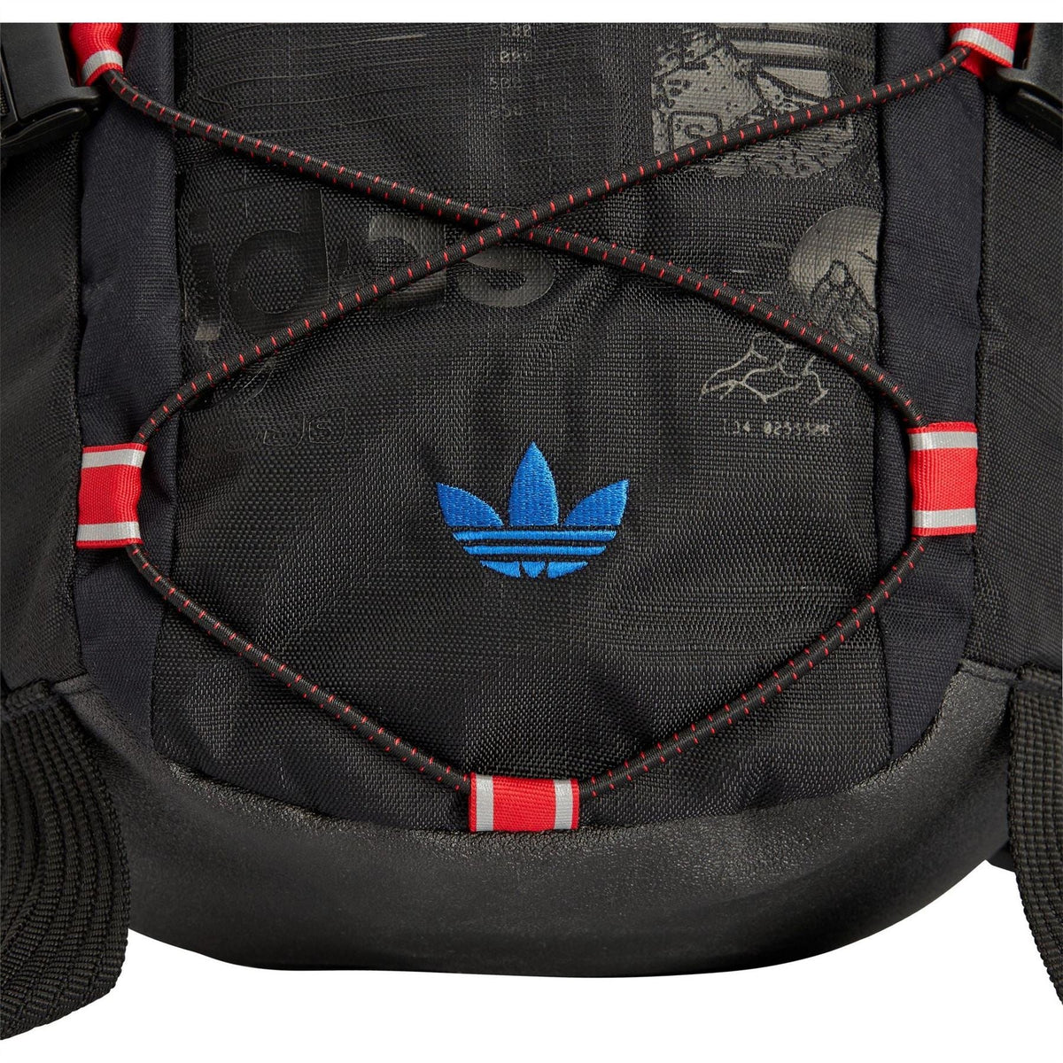 Front panel of dark carbon backpack with blue trefoil logo and red striped trim