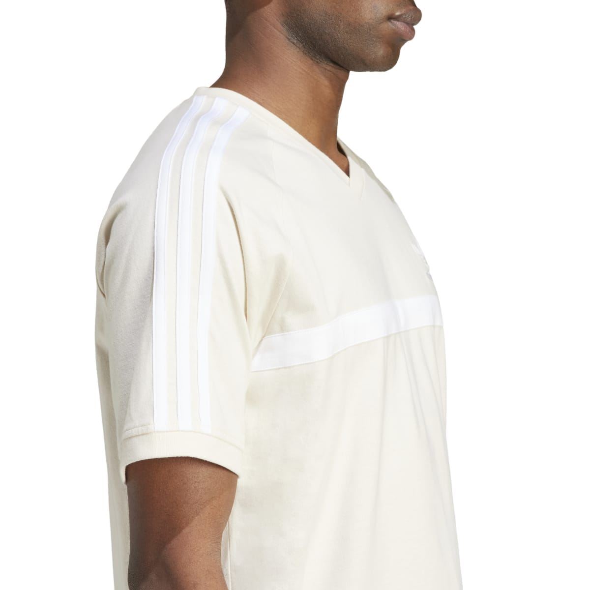 Off-white panel T-shirt side view with short sleeves and striped shoulder detail