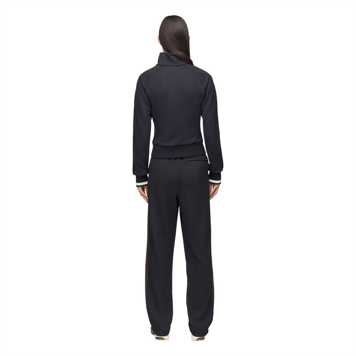Black track jacket rear view with full zip, stand collar, ribbed waist and cuffs