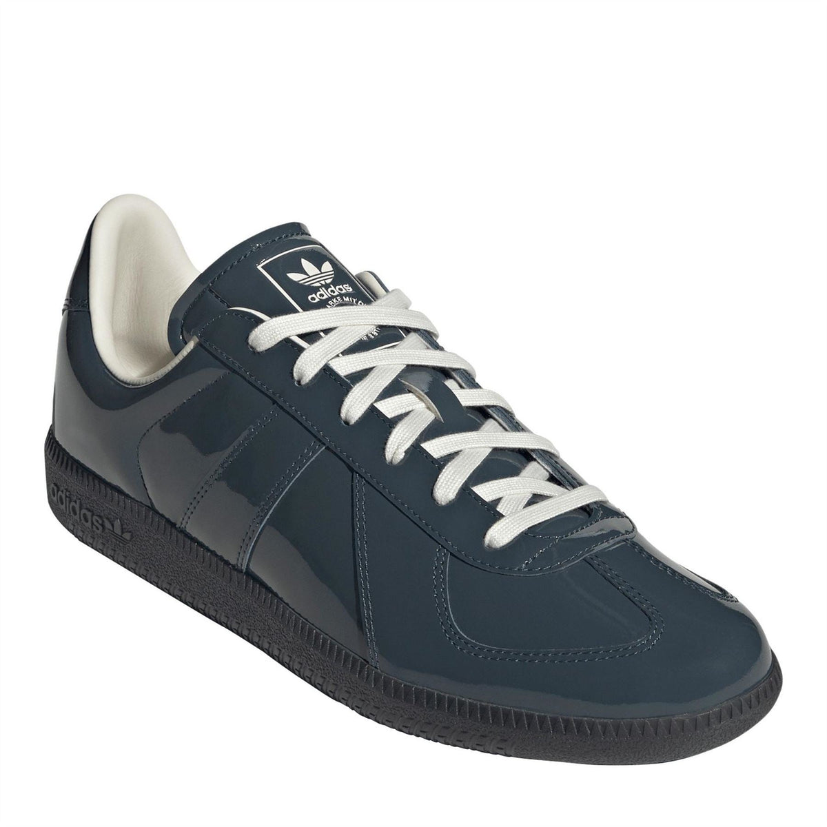 Dark petrol blue adidas lace-up sneakers with white stitching and textured rubber sole