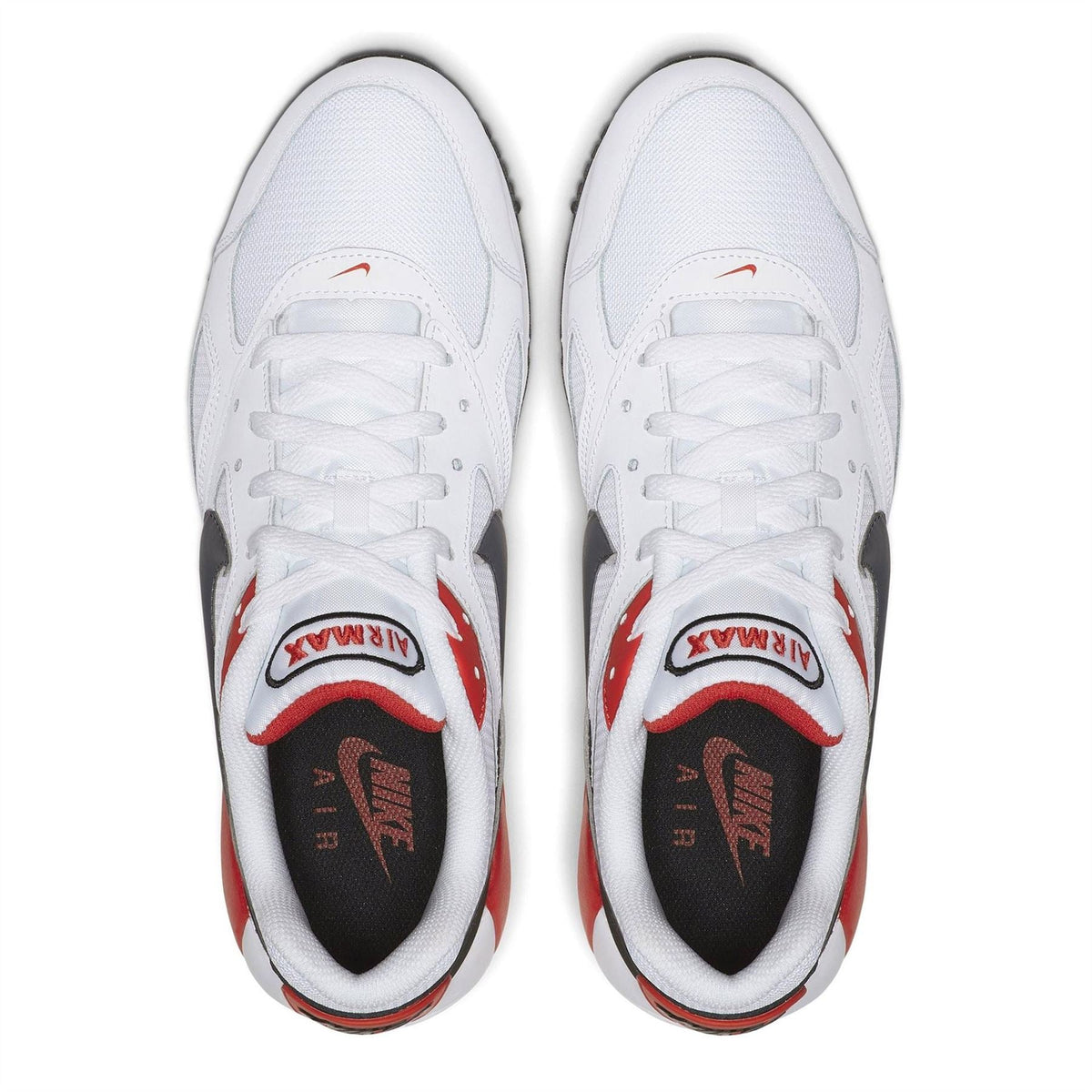 Pair of white Nike Air Max Ivo trainers with black interior and red lace collar