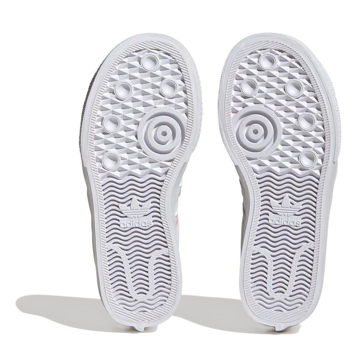 Kids' white platform sneakers with patterned outsole tread for grip