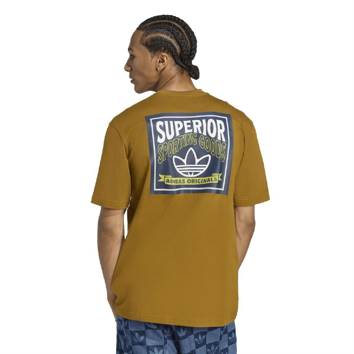 Mustard-gold back of crew neck short sleeve T-shirt with large “Superior” graphic