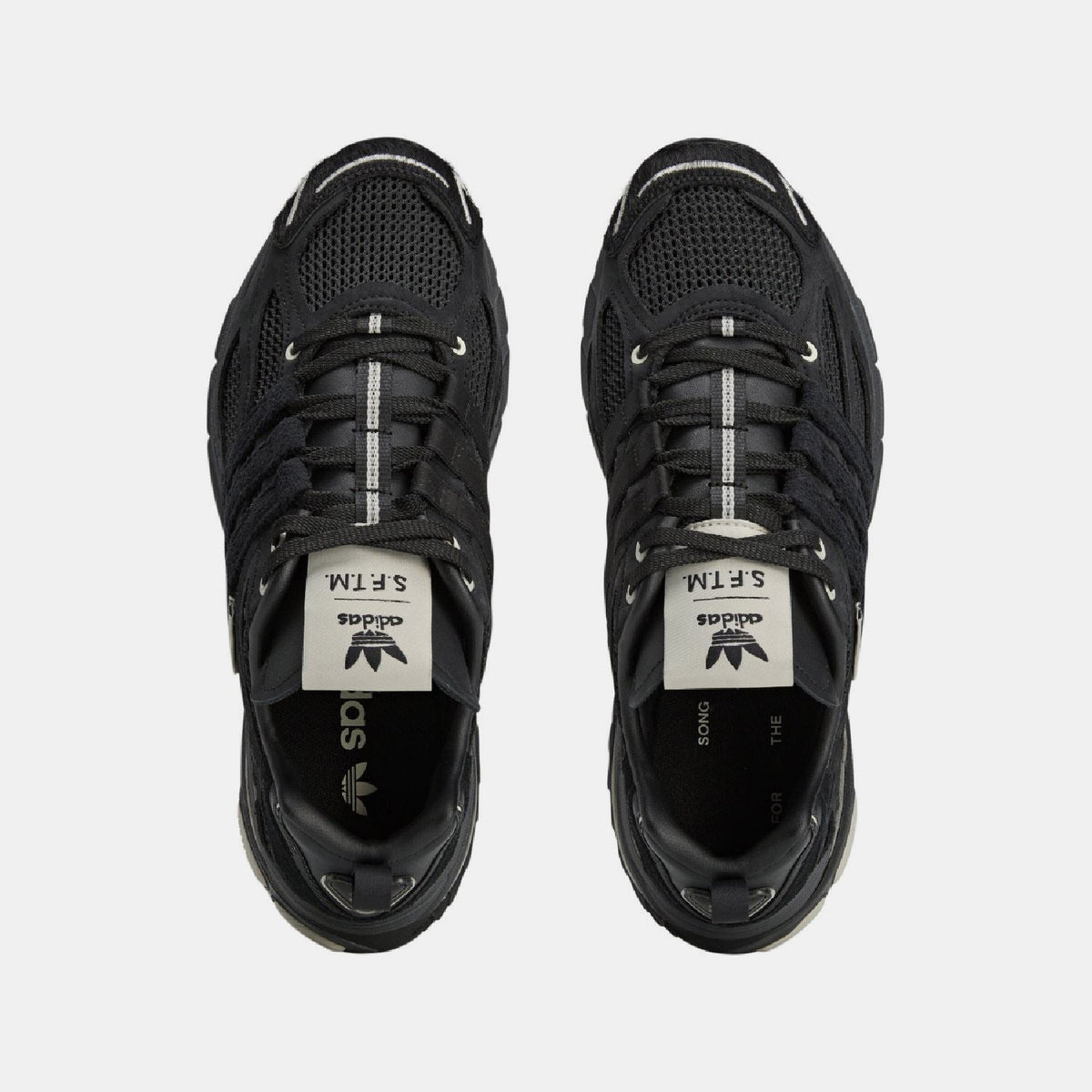 adidas Originals Adistar Cushion STFM trainers, athletic footwear with white and black design, cushioned sole and stylish look
