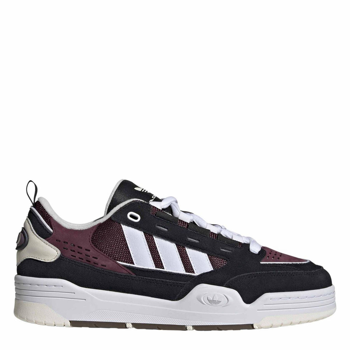 Low-top sneakers in black, burgundy and white, lace-up closure, chunky sole