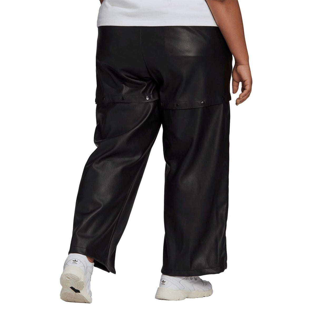 Black adidas Originals track pants with snap cargo pockets and relaxed wide legs