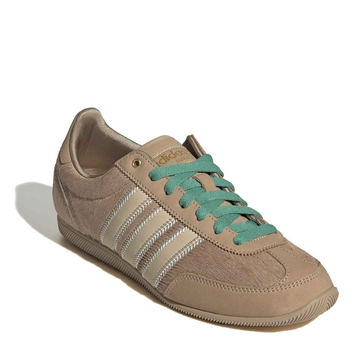 Suede Japan shoes in brown with teal-green laces and white side stripes