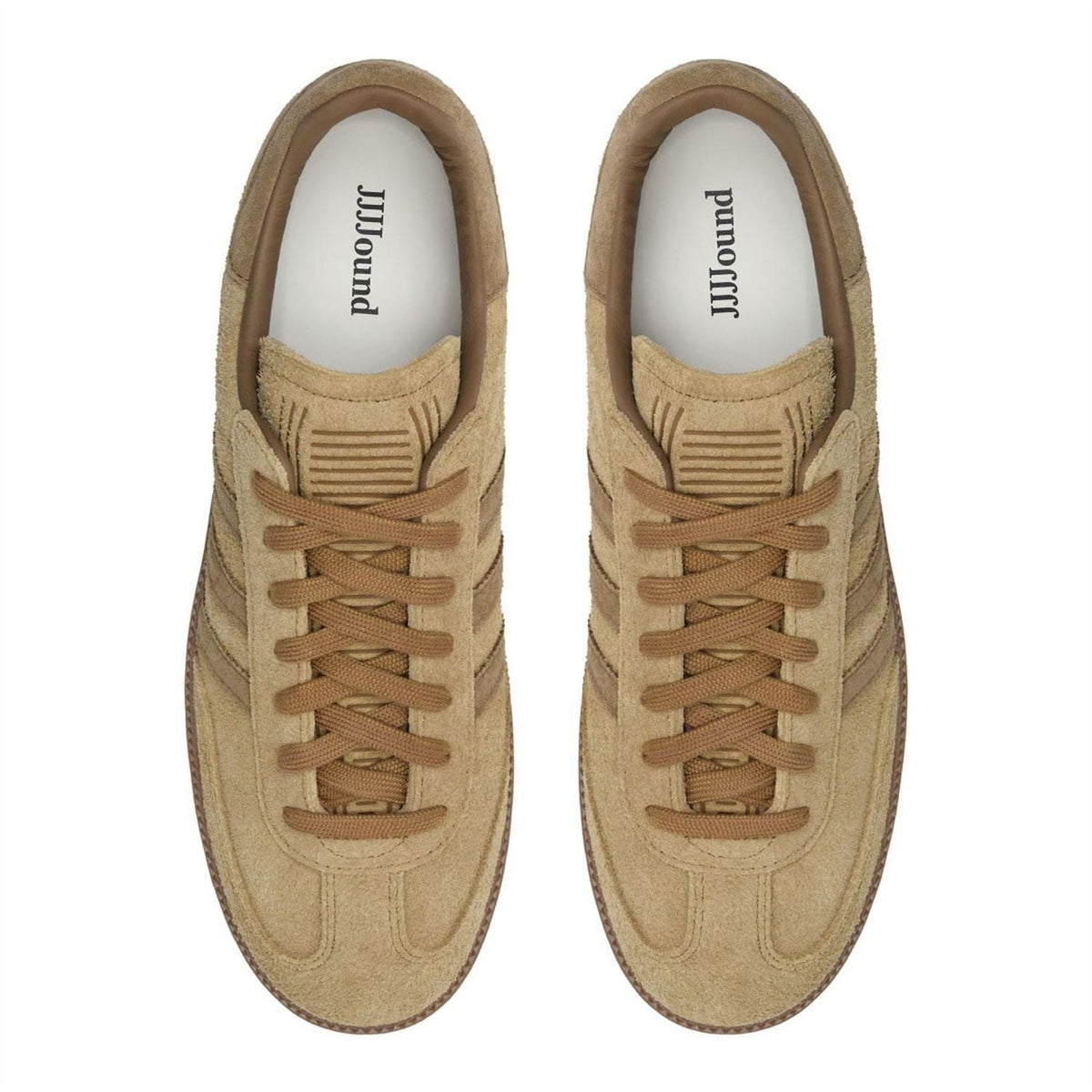Tan adidas Samba trainers, rounded toe and lace-up front; interior lining visible