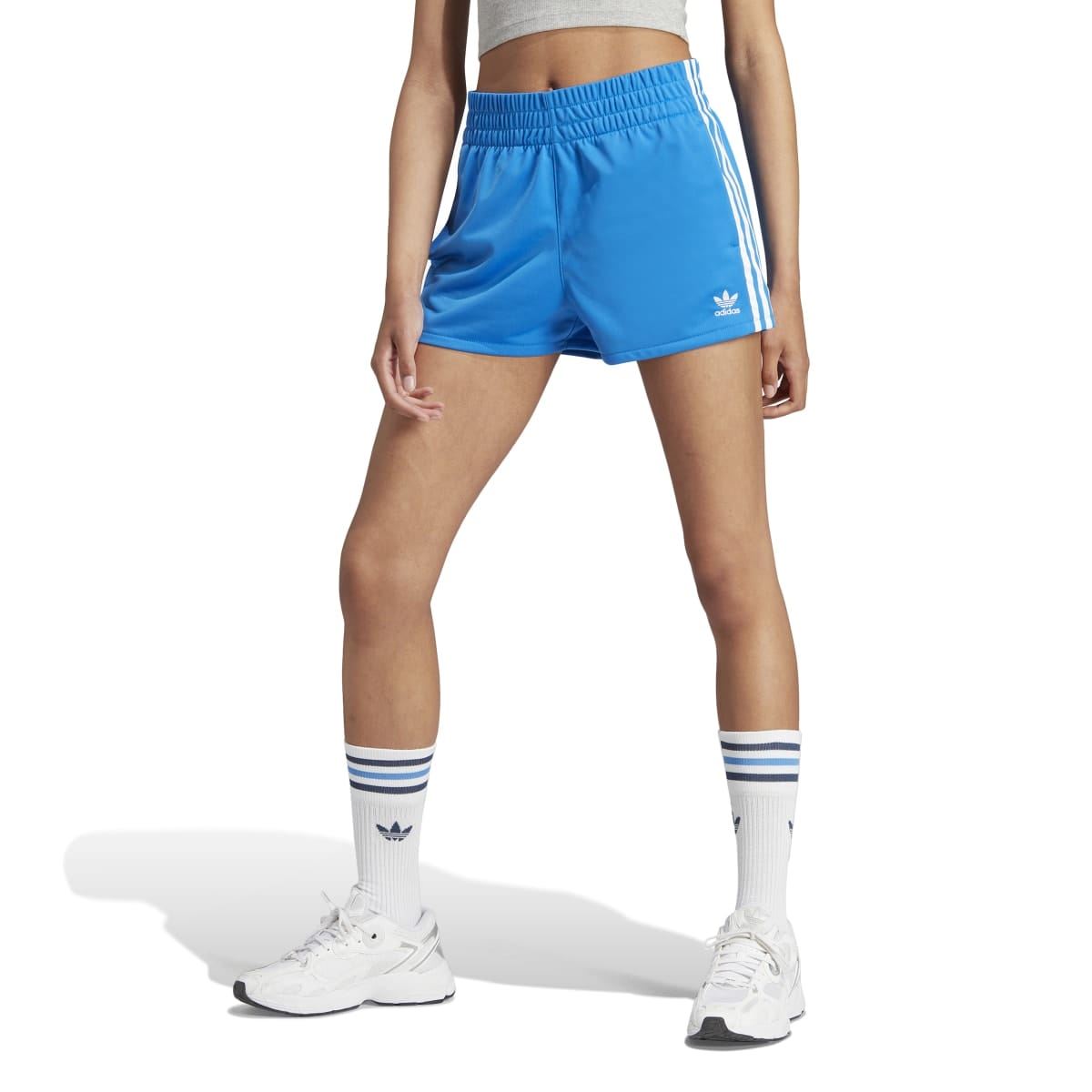 Blue Adidas Originals shorts with three white side stripes and Adidas logo