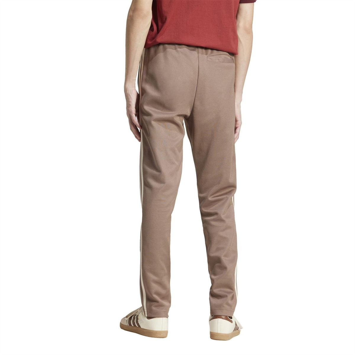 adidas Originals track pants, trace brown with tapered fit and white triple side stripes