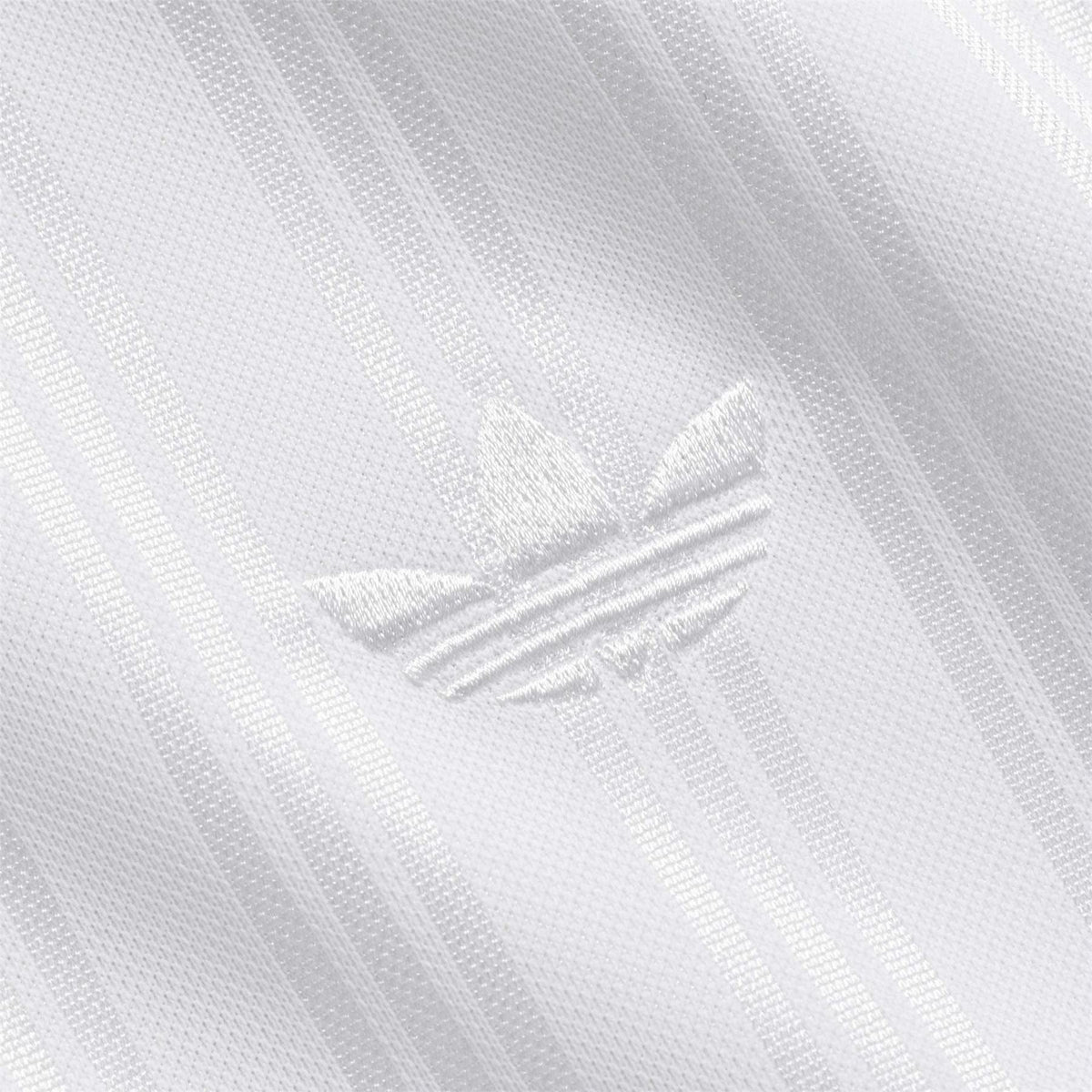 White jersey fabric with embossed adidas wing logo detail