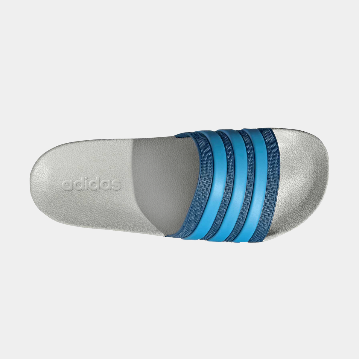 Adilette shower slides side view, blue ribbed three straps over light gray sole