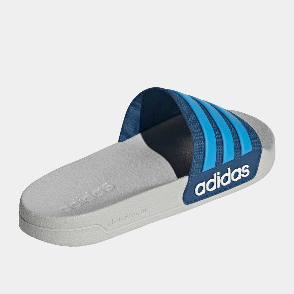 Adilette shower slides top view with dark blue interior and blue three-strap band