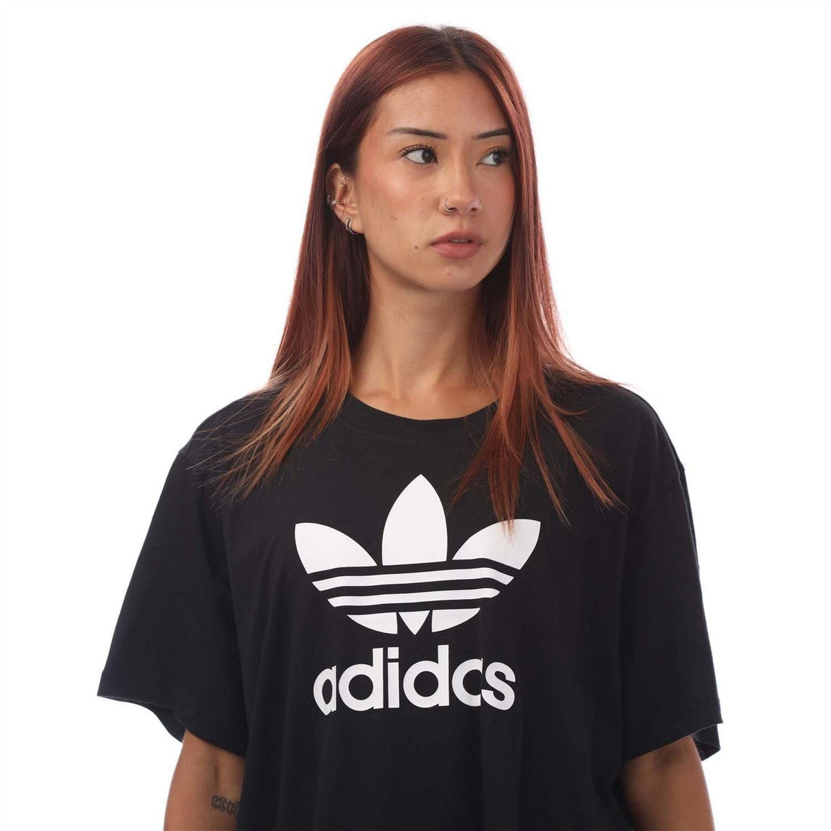 Black boxy T-shirt with large white adidas Trefoil logo, crew neck