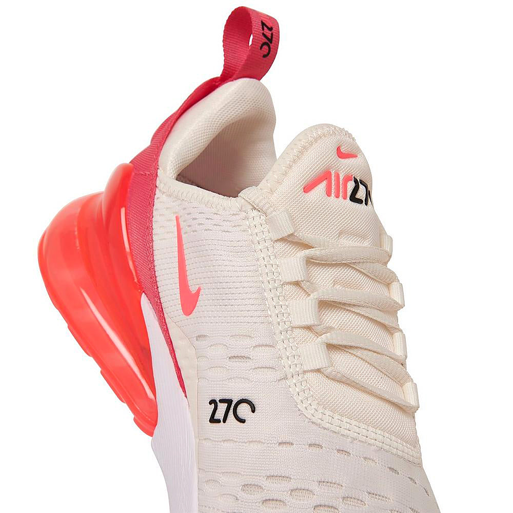 Women's Nike Air Max 270 upper close-up: sail knit with hot pink collar and 270 text.
