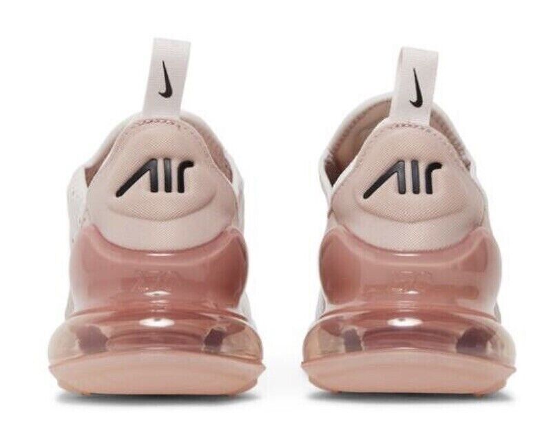 Women's Nike Air Max 270 sneakers heel view with Air logo, light pink uppers and pink air unit