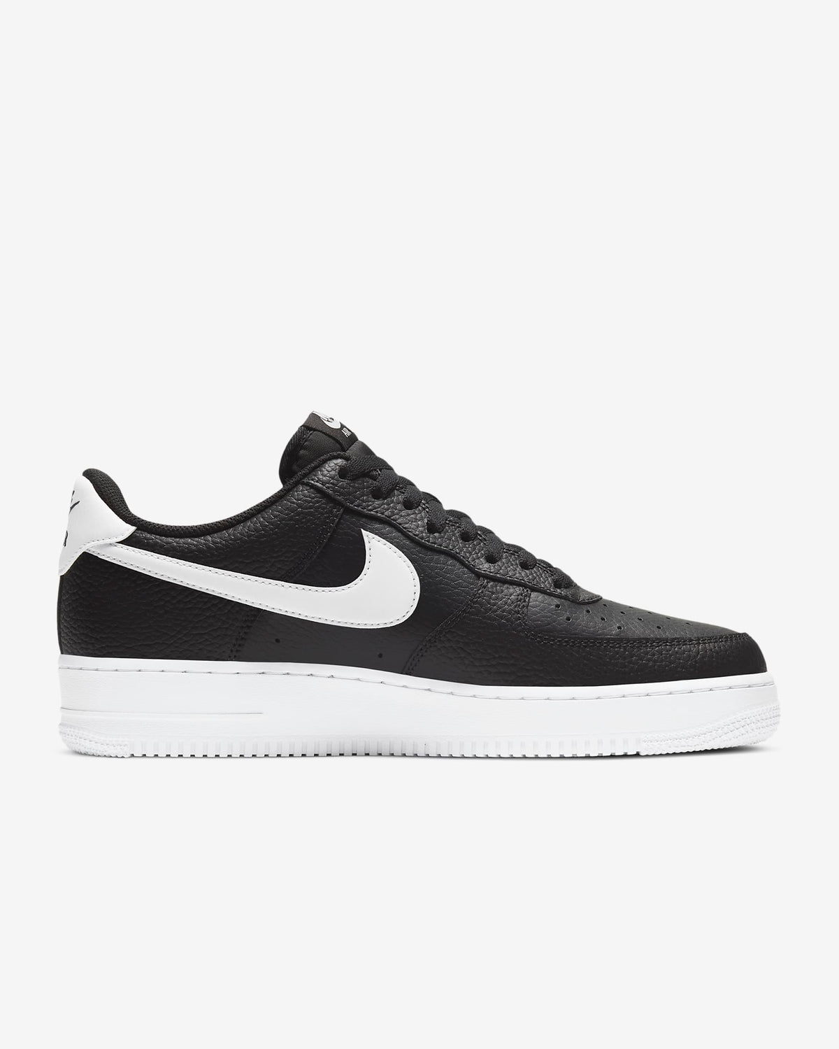 Black leather low-top sneaker with white Nike swoosh and white midsole