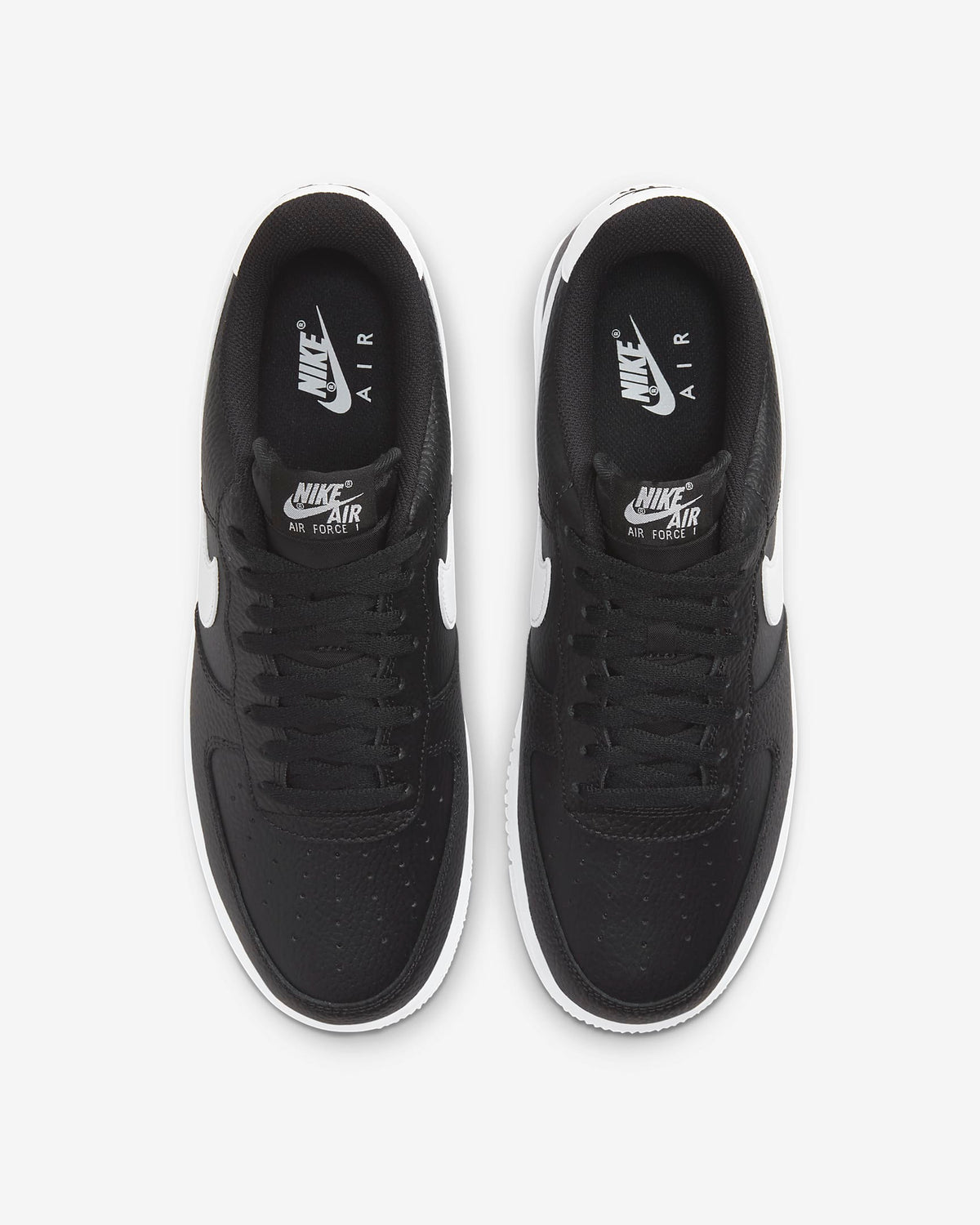 Black sneaker tongue and laces with white Nike Air branding inside