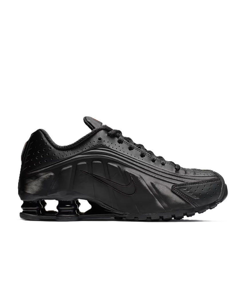 Women's black running sneaker with sculpted Shox midsole and lace-up