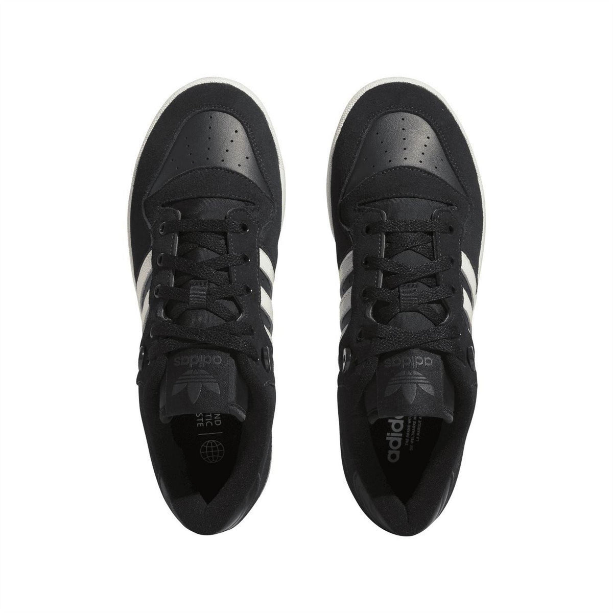 Pair of black low-top trainers with black laces and perforated toe panels
