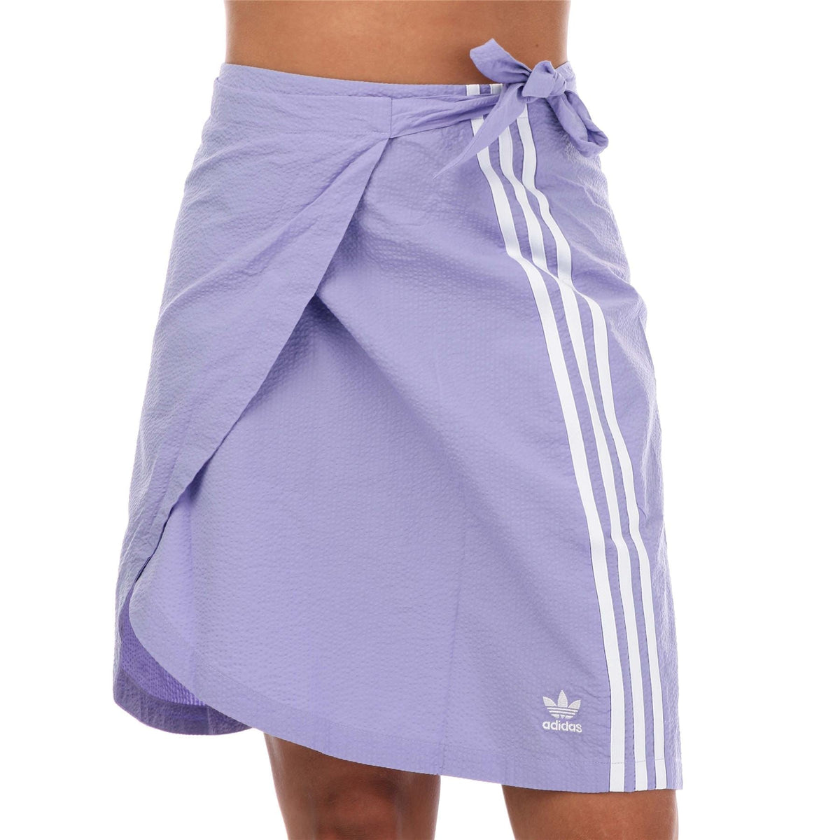 Purple tie-front skirt with bow waistband and white adidas stripes