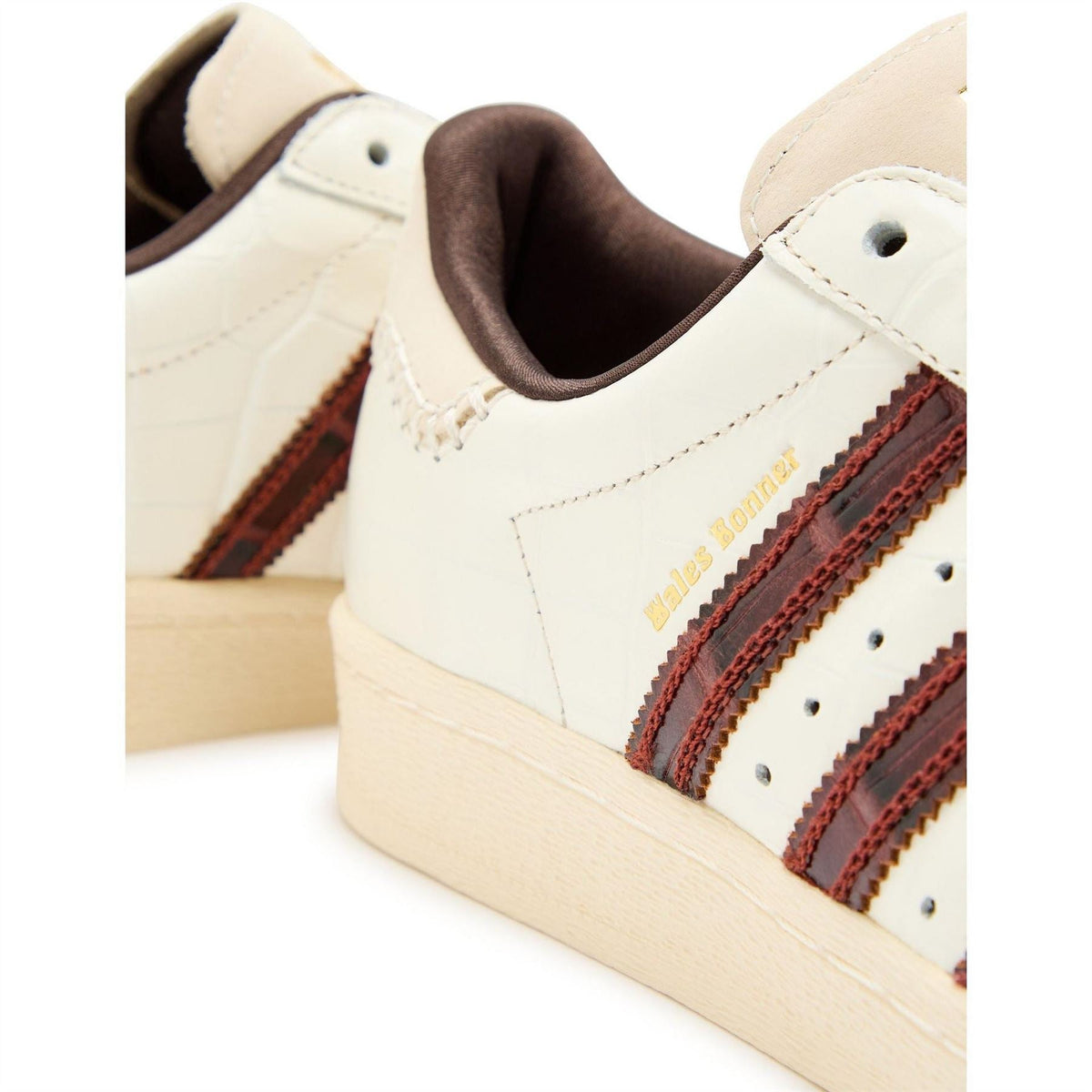 adidas Originals Superstar close-up, white leather with lace eyelets and triple stripe panel