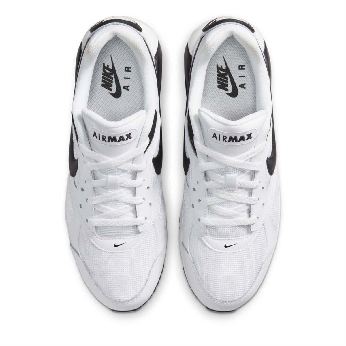 Air Max Ivo trainers in white with black accents, lace-up design, and visible Air window.