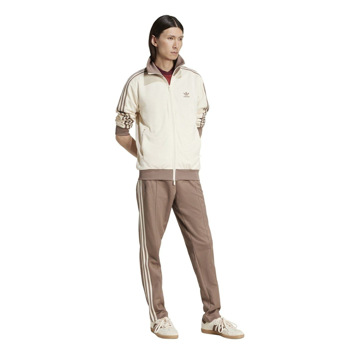 adidas Originals long sleeve athletic top with funnel neck and jersey material, designed for active wear and sports activities