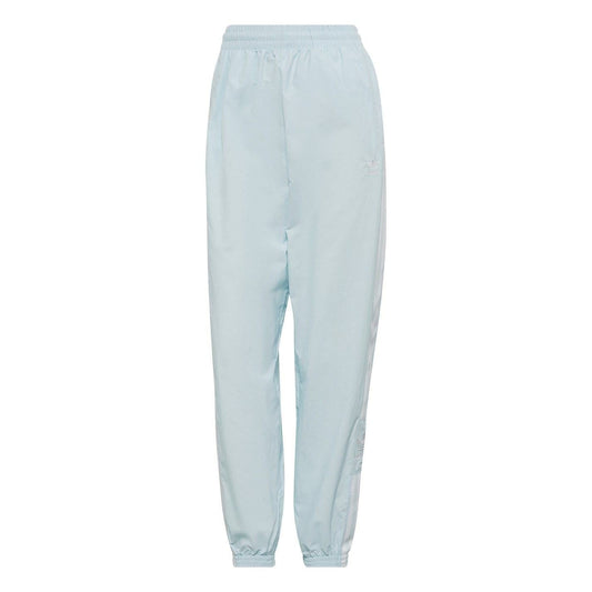 Light blue track sweatpants with elastic drawstring waistband and cuffed ankles