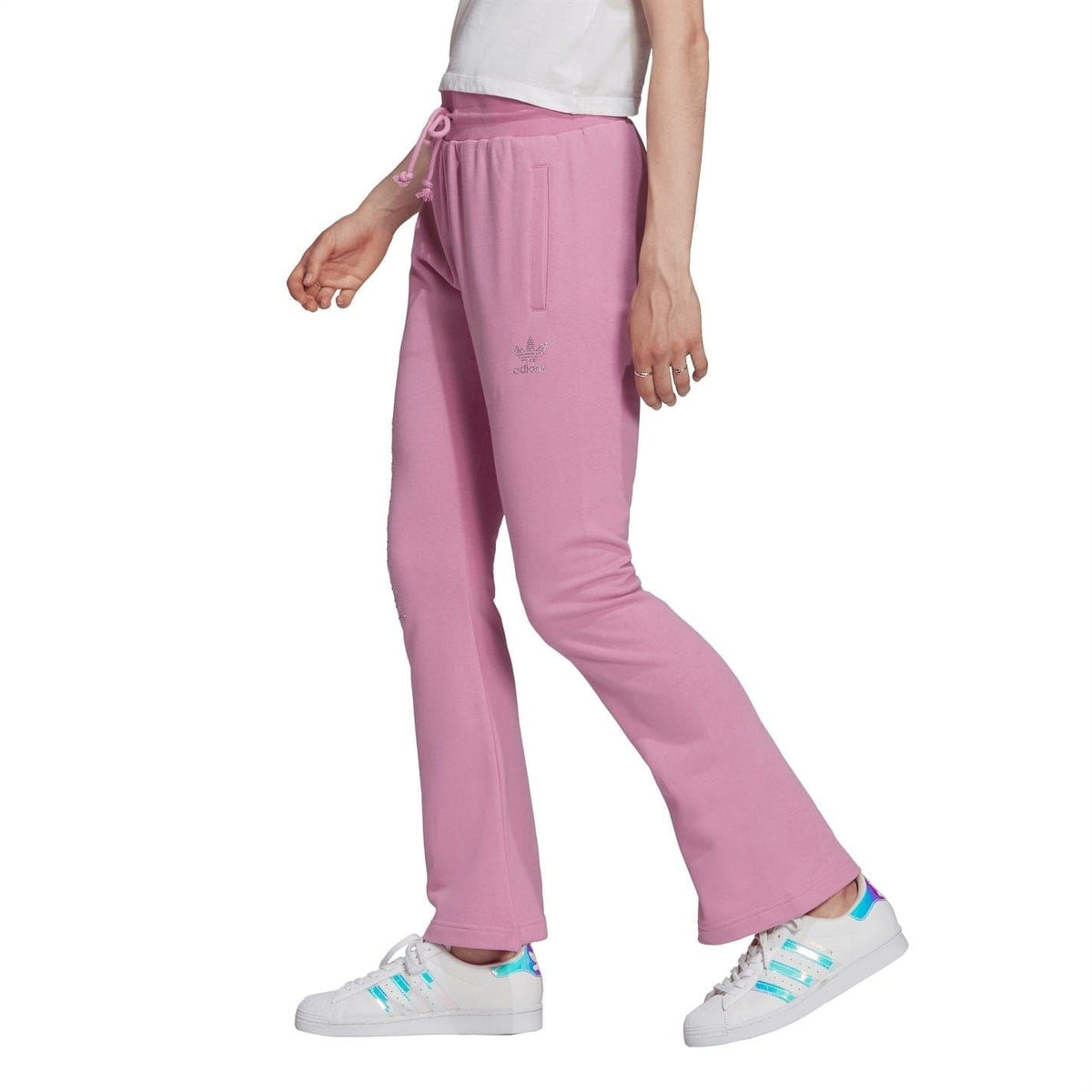 adidas Originals Luxe Track Pants featuring a sleek design, comfortable fit, and sporty style suitable for casual wear.