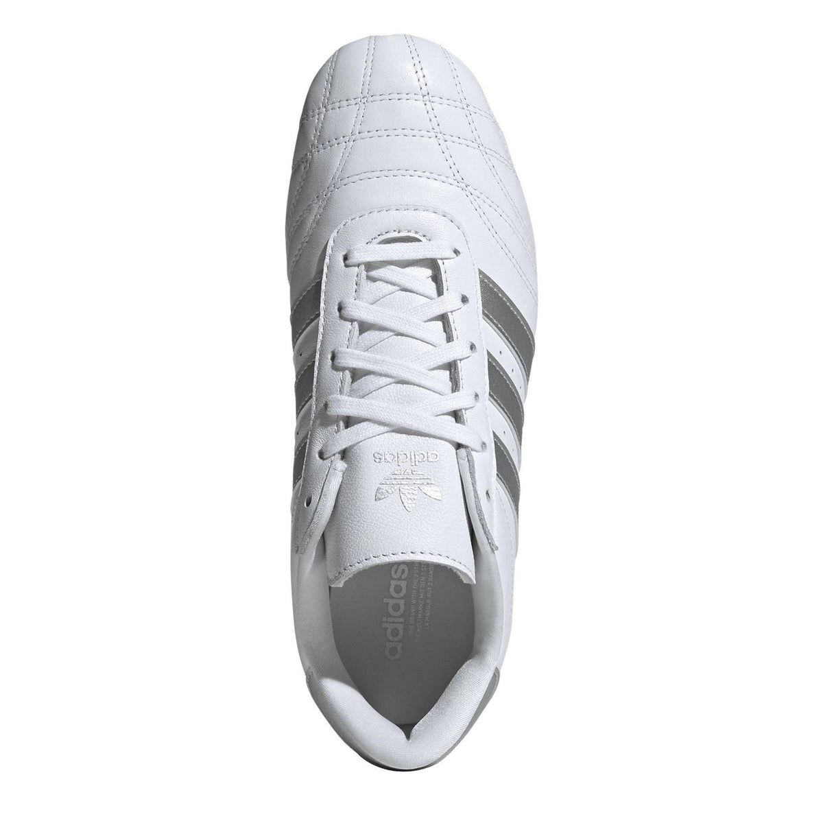 adidas Originals Taekwo low top sneakers in black and white with lace-up design and sporty silhouette.