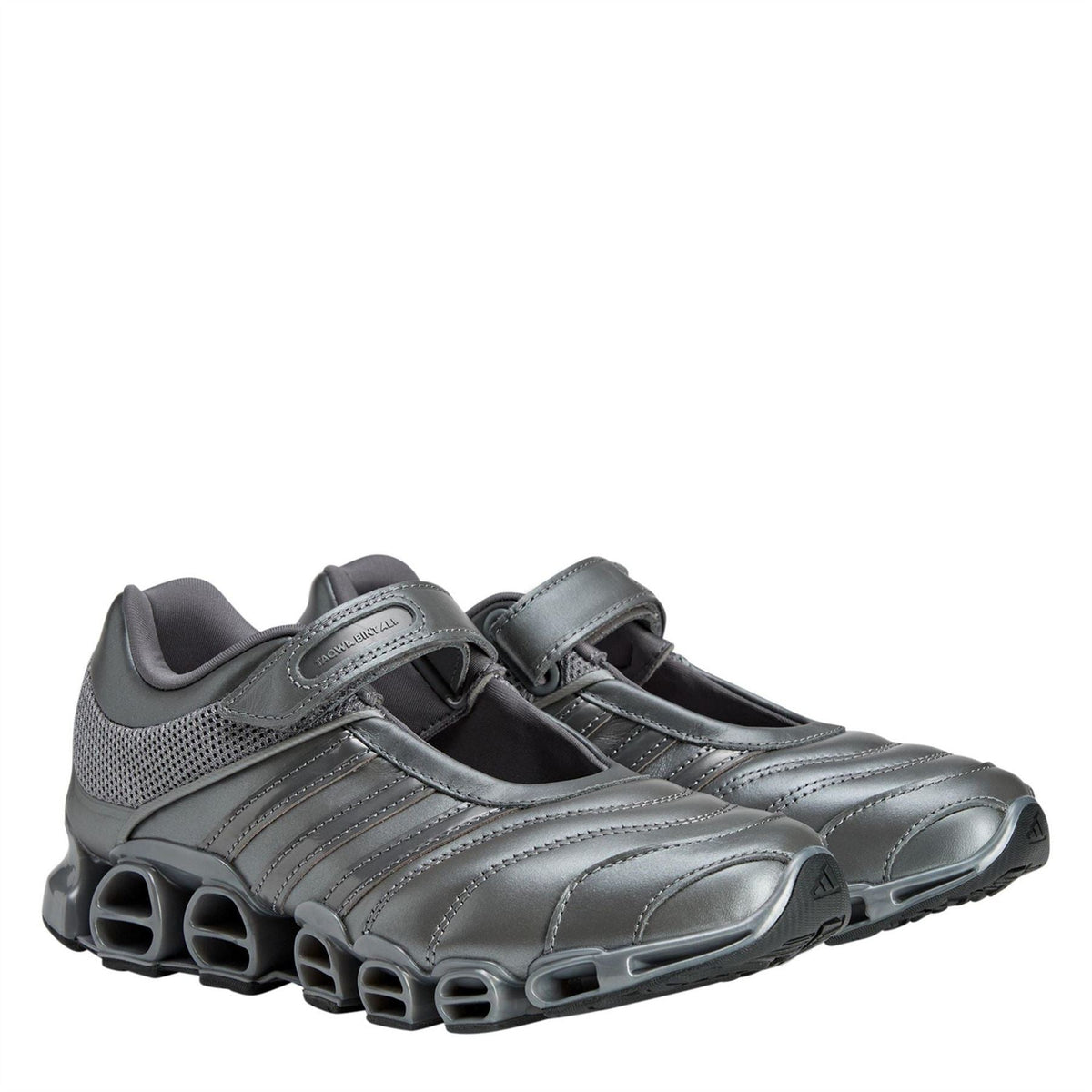 Gray adidas Originals Megaride Taqw sneakers, front angle showing laces and molded cage